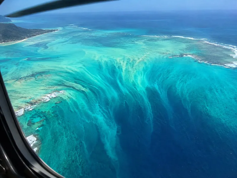 The underwater waterfall illusion off Le Morne seen from a helicopter